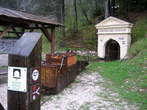 Bovec with neighbourhood - Log pod Mangartom - Mine's tunnel Stoln with old mine's train in front 