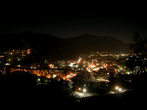 Ravne na Koroskem - Western side at night, mountain Peca back Ravne na Koroskem - Western side at night, mountain Peca back