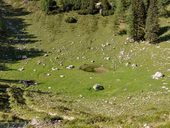 Sinkhole pond in the form of heart