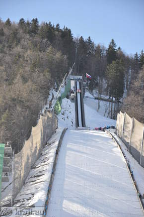 Ski jumper on the top of the flying hill