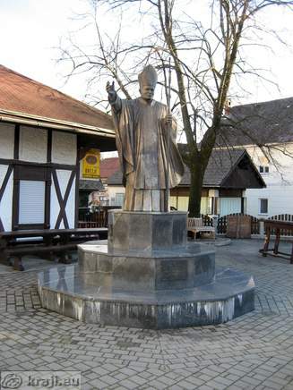 Monument in memory of Pope John Paul II near Basilica in Brezje