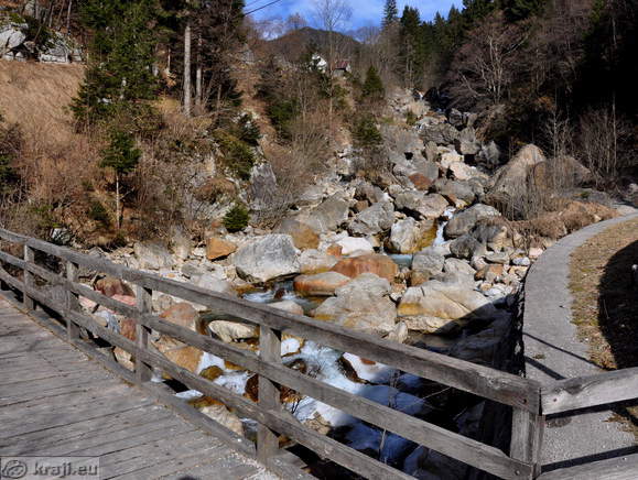 Wooden bridge and the cascades