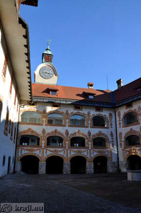 Castle yard with small tower with clock
