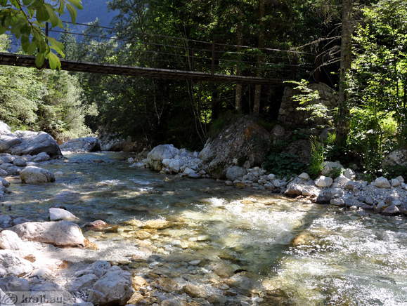 Hanging footbridge connecting hamlet Pri Cerkvi and the Soca Trail