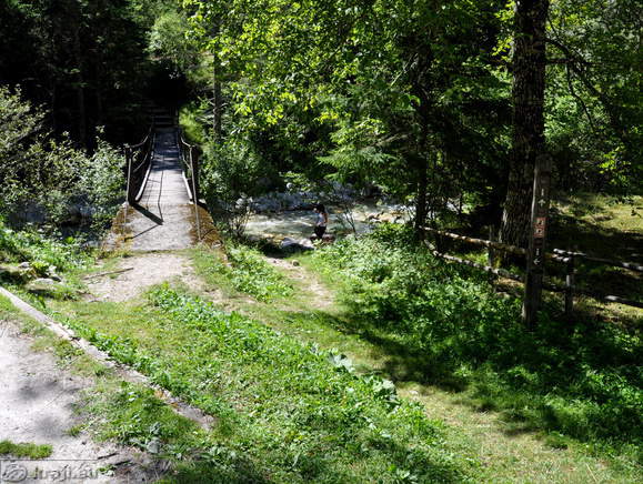 Hanging footbridge near the small parking area at hamlet Pri Cerkvi