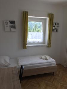 Apartmaji in sobe Tina 