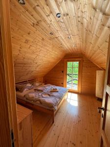 Loghouse Brunka - Escape from life on a highway 