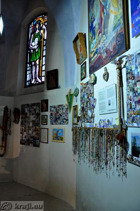 Wall with photos and other souvenirs