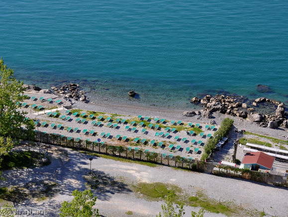 Deckchairs on the beach in Sistiana