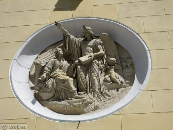 Medallion (plastic) of Ivan Zajc on the front side of church Medallion (plastic) of Ivan Zajc on the front side of church