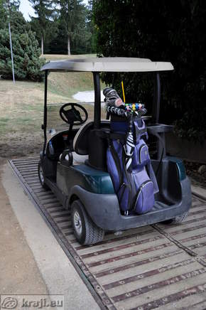 Golf cart with golf equipment