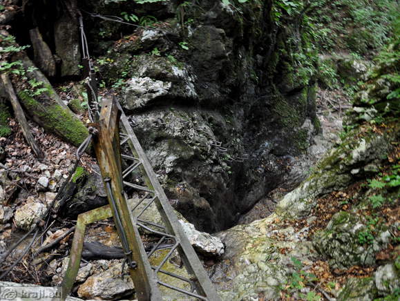 Iron bridge and the view to the step pegs in the one of the most dangerous parts of the Hudicev graben Gorge Iron bridge and the view to the step pegs in the one of the most dangerous parts of the Hudicev graben Gorge