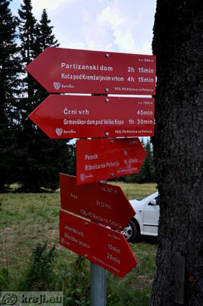 Direction signs - Jezerski vrh 15min, Lake Ribnisko jezero 20min, Rogla 3h 20min, Grmovskom dom pod Veliko Kopo 1h 30min, etc.