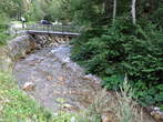 Parking area in front of Logar Valley - Wooden footbridge over Savinja in the Logar Valley direction 