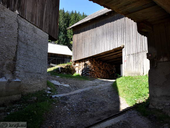 Path below outbuildings