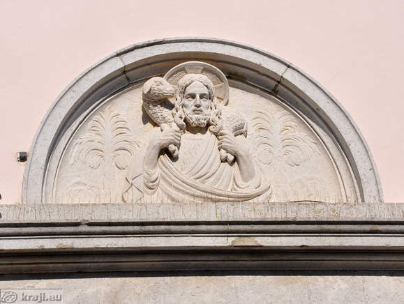 Figure above the portal