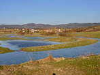 Klenik - Flooded Pivka and Klenik in the background 