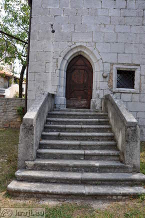 Stairs in front of the gothic entrance