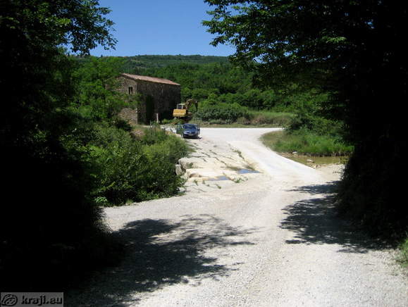 Crossing over brook Rokava near Skrline