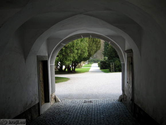 View in the park direction through the former main entrance into monastery