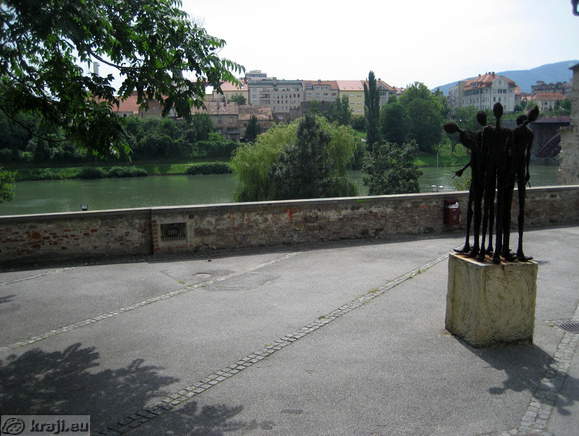Statue Five organic perils  and river Drava